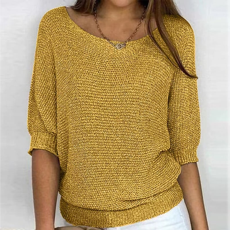Solid color sweater with a round neckline and 3/4 sleeves Solid color sweater with a round neckline and 3/4 sleeves